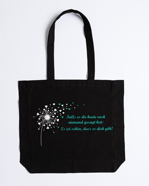 Stofftasche „Falls es dir heute noch niemand gesagt hat“ in Schwarz mit weißer Pusteblume und türkisem Spruch