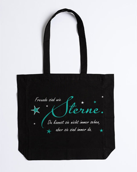 Stofftasche „Freunde sind wie Sterne“ in Schwarz – Schriftzug „Sterne“ mit Sternen in Türkis