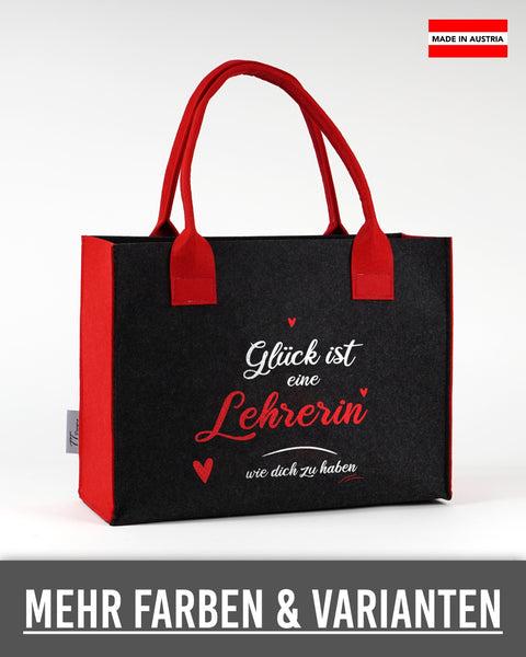 Filztasche „Glück ist eine Lehrerin wie dich zu haben“ in Dunkelgrau mit roten Seiten und Henkeln – „Lehrerin“ und Herzen in Rot