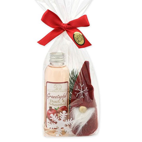 Dusch- & Schaumbad mit Schafmilch Granatapfel 75ml, Wichtel „Stoff-Santa“ bordeaux 10cm, Tannenzweig und Schneeflocke verpackt in Cello